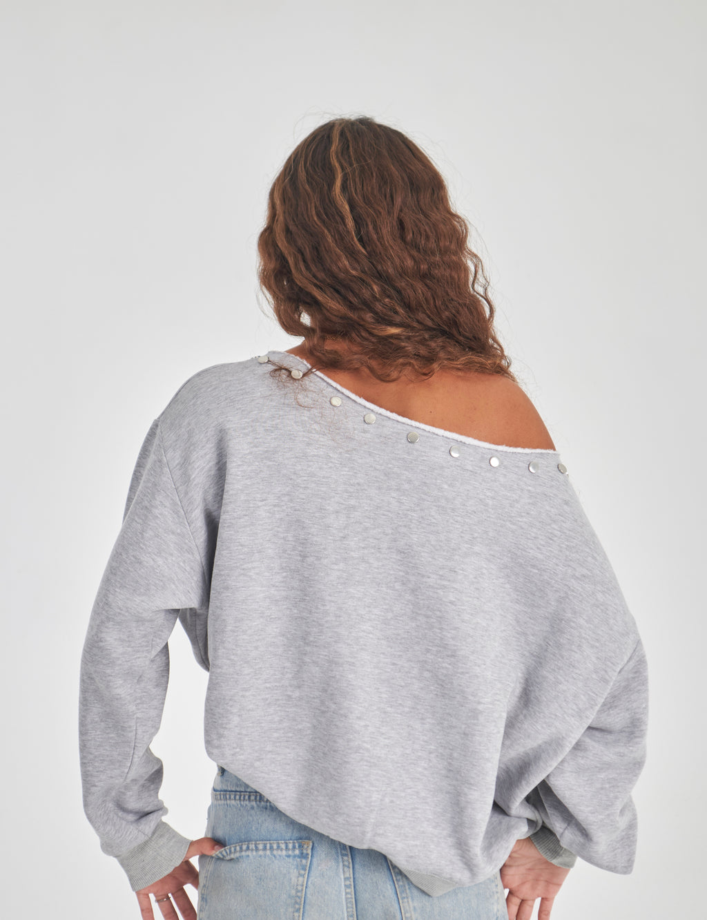 Studded grey off-shoulder sweater
