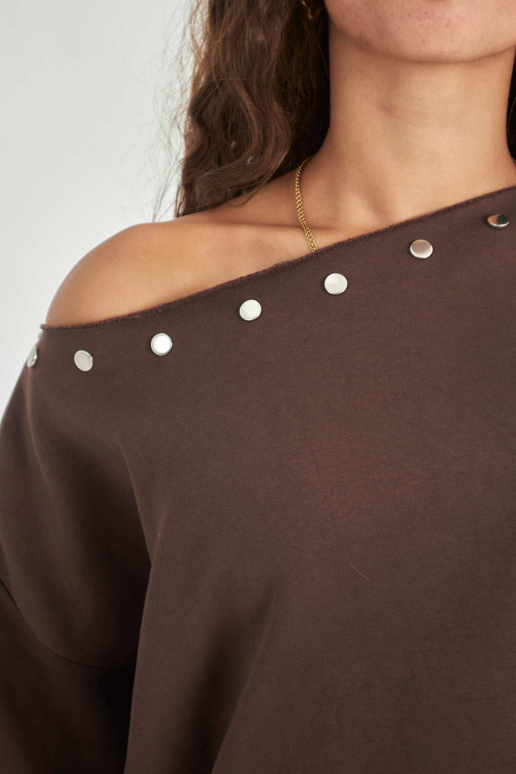 Studded brown off-shoulder sweater