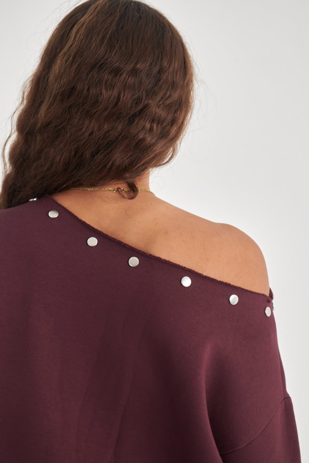 Studded burgundy off-shoulder sweater