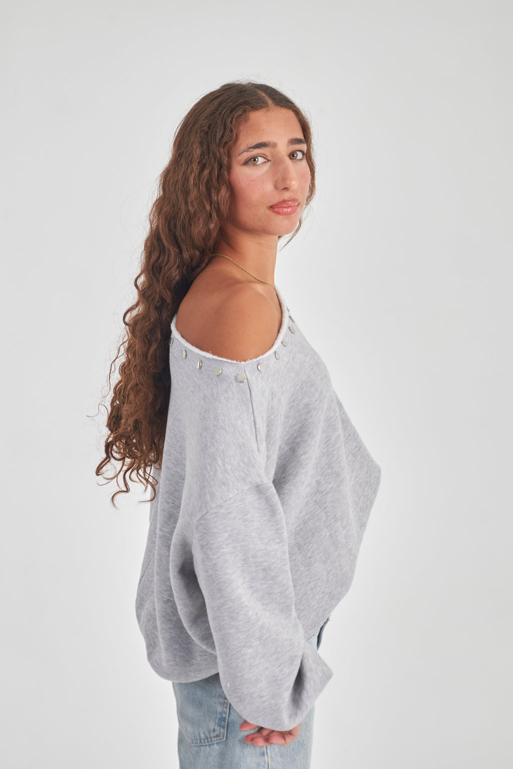 Studded grey off-shoulder sweater