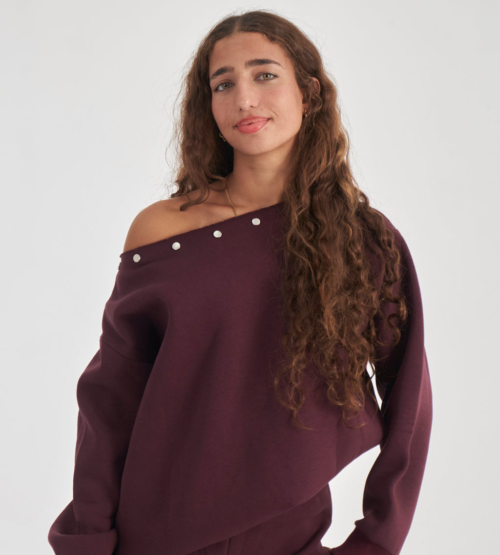 Studded burgundy off-shoulder sweater
