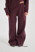 Studded burgundy sweatpants