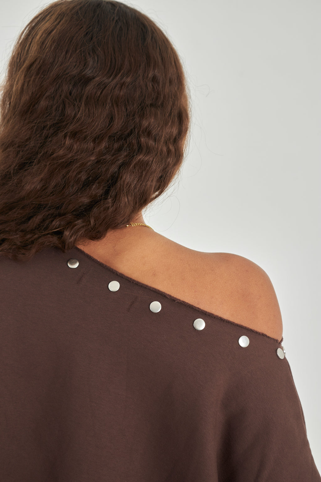 Studded brown off-shoulder sweater