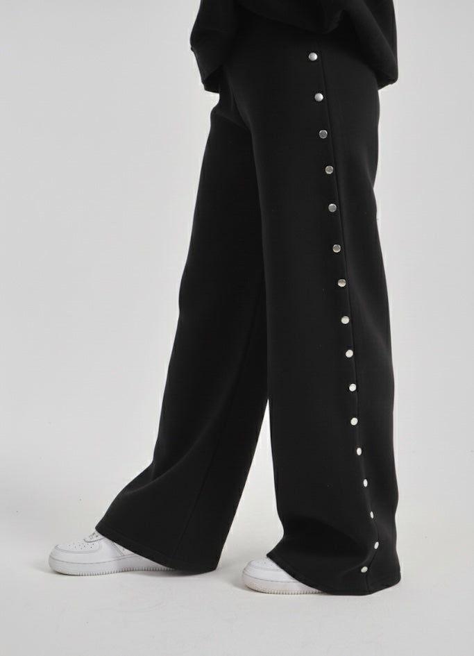 Studded black sweatpants