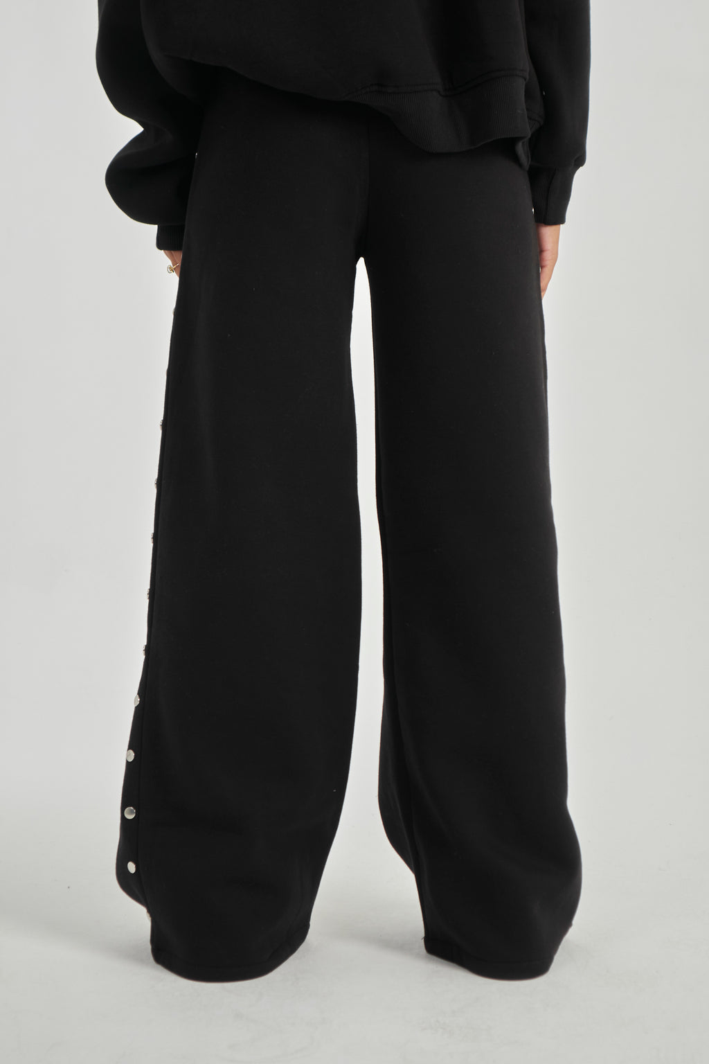 Studded black sweatpants
