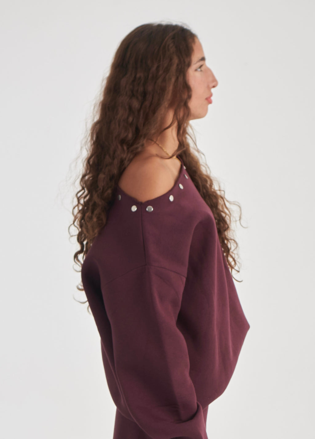 Studded burgundy off-shoulder sweater