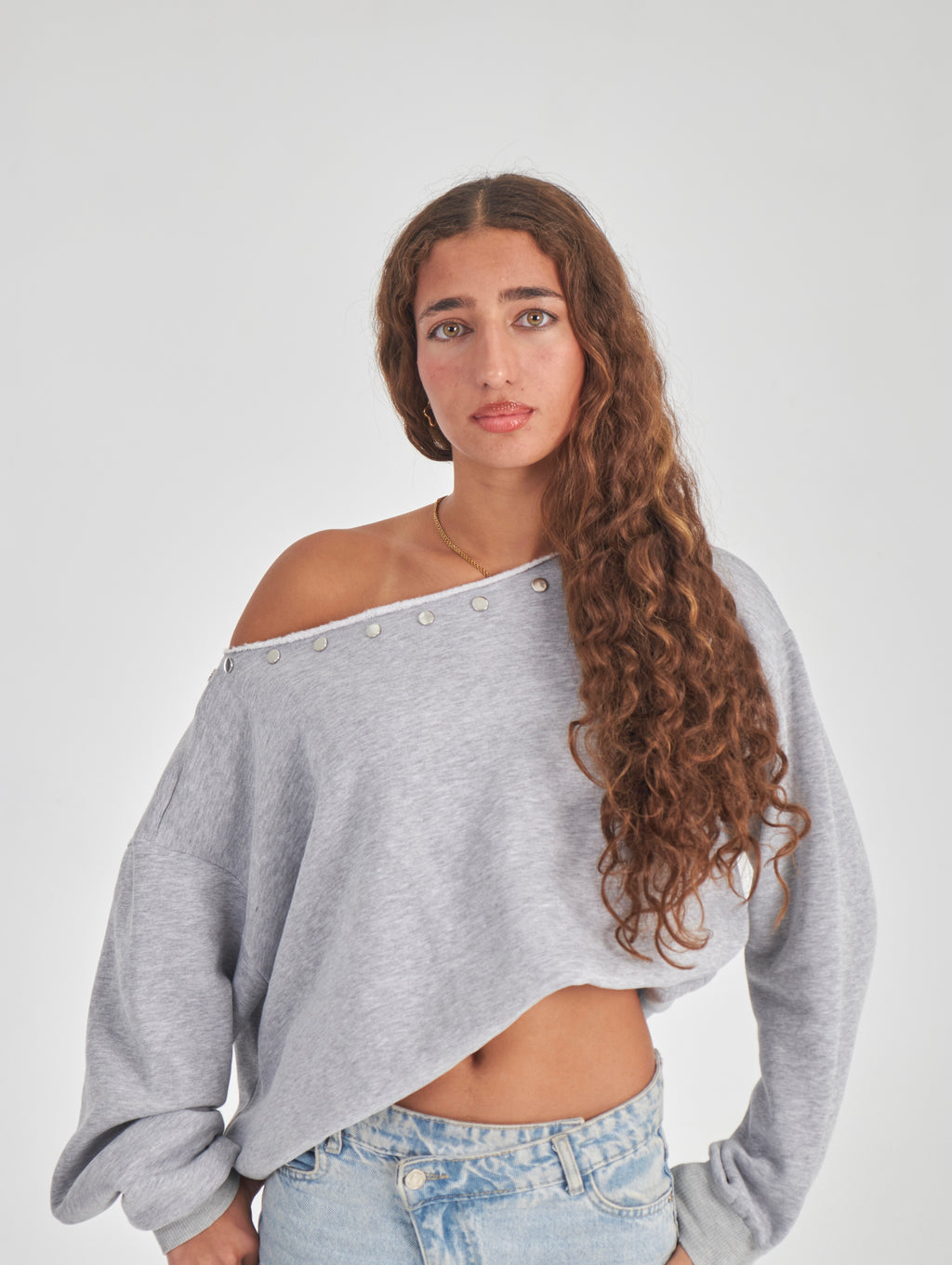 Studded grey off-shoulder sweater