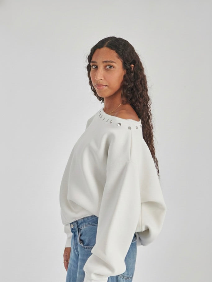 Studded white off-shoulder sweater