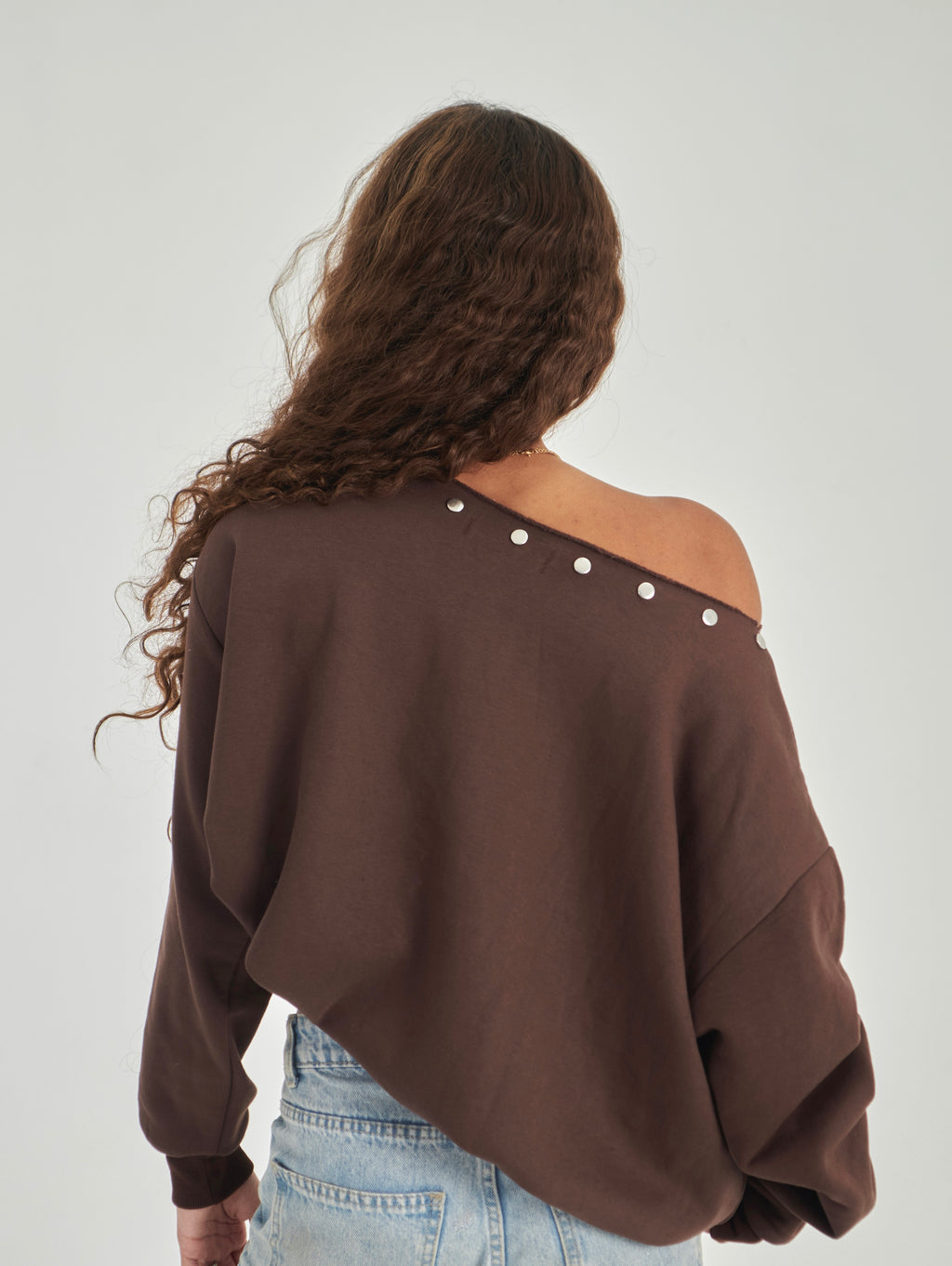 Studded brown off-shoulder sweater